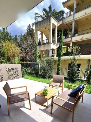 Luxury Apartment, Garden View | Terrace/patio
