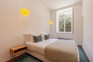 Apartamento | 1 dormitorio y tabla de planchar con plancha