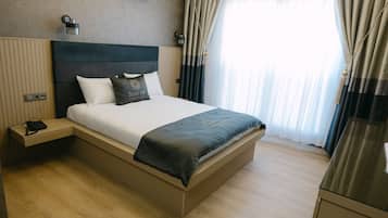 Premium bedding, minibar, desk, laptop workspace