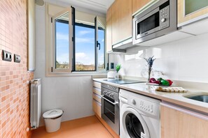 Fridge, microwave, oven, cookware/dishes/utensils