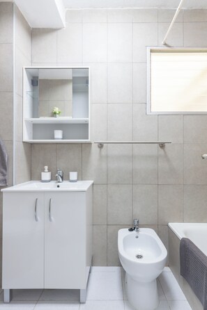 Hair dryer, bidet, towels, soap
