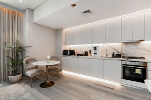 Premium Apartment, Balcony, City View | Private kitchen | Espresso maker, electric kettle, toaster, freezer
