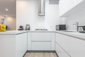 Fridge, microwave, oven, stovetop - NOK Designer 2BR in Usaquén (Bogotá)