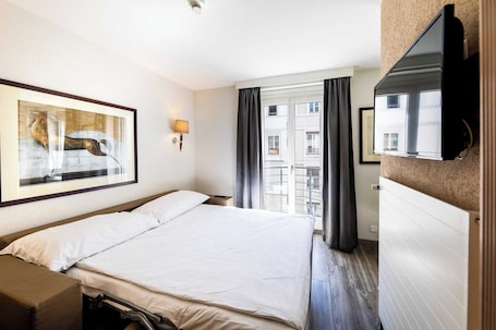 1 habitación y ropa de cama