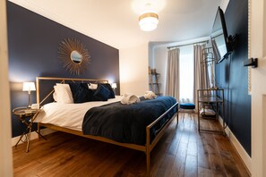 2 quartos, ferros/tábuas de passar roupa, Wi-Fi de cortesia