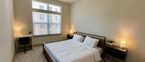 1 bedroom, desk, iron/ironing board, travel crib