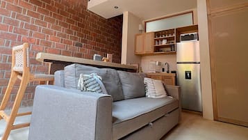 Villa de lujo, 2 habitaciones, alberca privada | Área de sala de estar