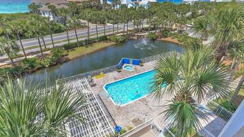 Condo, Multiple Beds (Gulf Place Caribbean 313- Sunsets on ) | Pool | Outdoor pool, a heated pool