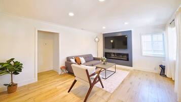 House, Garden View (4 Bedrooms) | Living room | 43-inch flat-screen TV with cable channels, fireplace