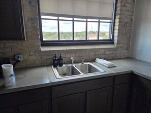 Deluxe Suite, River View | Private kitchen