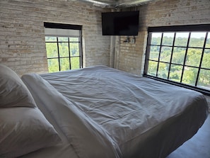 Deluxe Suite, River View | 2 bedrooms, memory foam beds, in-room safe, individually furnished