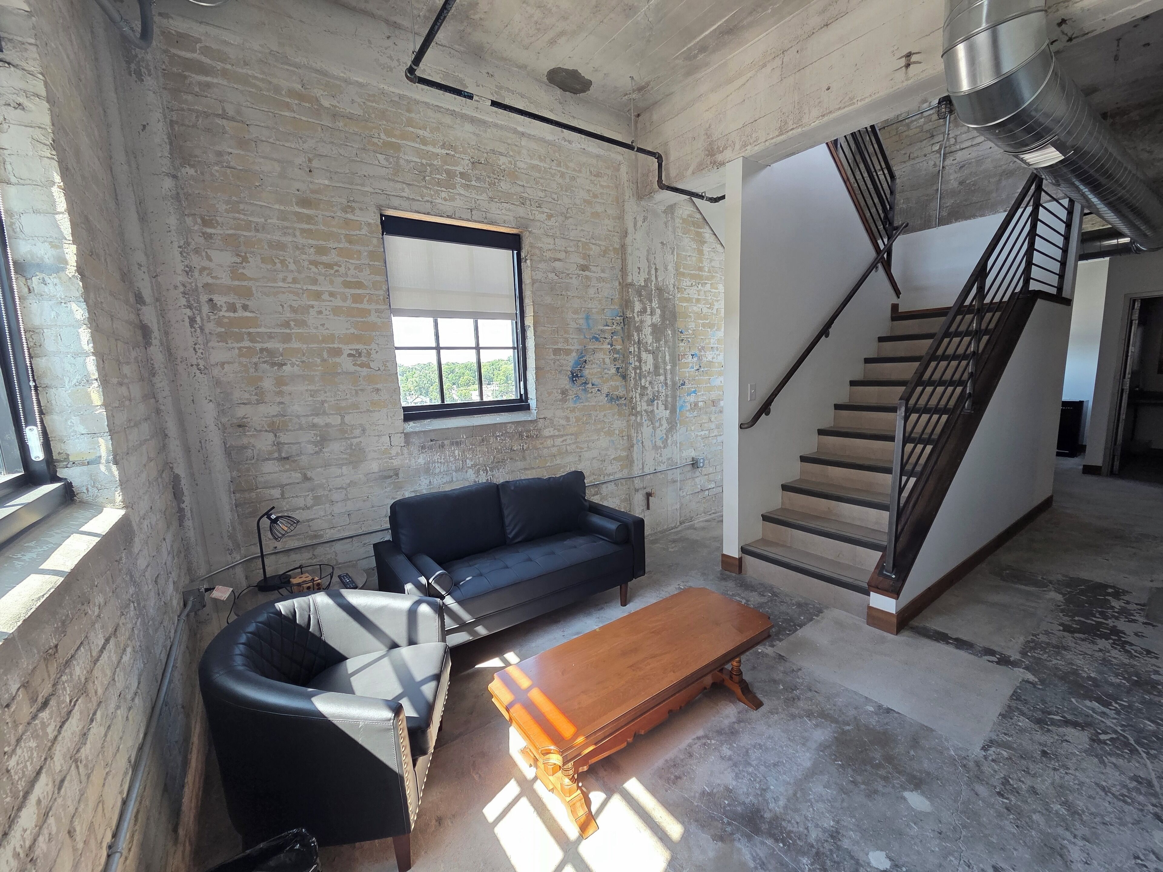 Deluxe Suite, River View | Living area