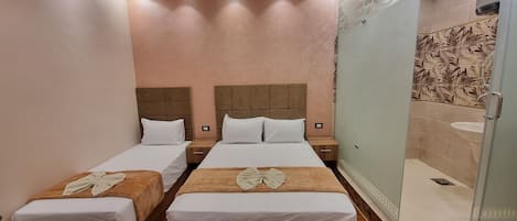 Frette Italian sheets, premium bedding, down duvets, pillow-top beds