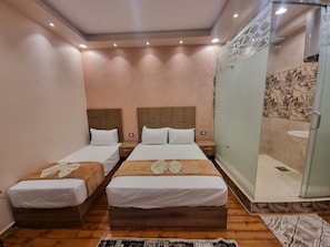 Frette Italian sheets, premium bedding, down comforters, pillowtop beds - Cairo Plaza Prime Hotel (Cairo)