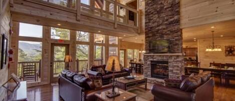 TV connectée, cheminée, lecteur de DVD, baby-foot