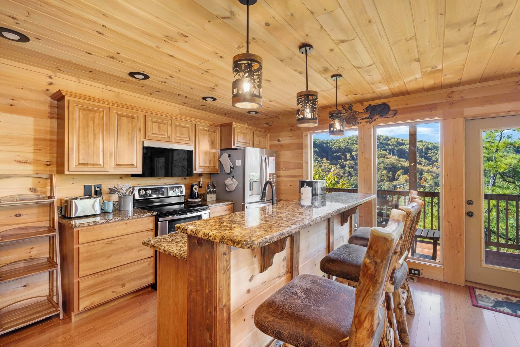 Fridge, dishwasher, coffee/tea maker, cookware/dishes/utensils