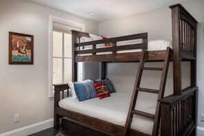 A bunk bed with a ladder, a small table, and a framed picture on the wall. - South Oak Retreat - convenient luxury by gondola! (Telluride)