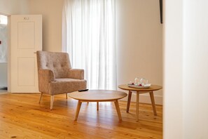 Deluxe Suite, Private Bathroom, Pool View | 1 bedroom, desk, laptop workspace, free WiFi