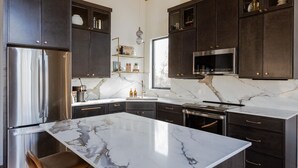 Coffee/tea maker, fridge, microwave, oven