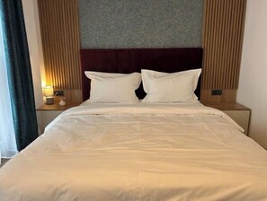 1 chambre, fer et planche à repasser, Wi-Fi gratuit, draps fournis