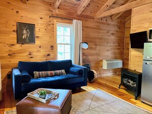 Hytte – deluxe, 1 kingsize-seng | Oppholdsområde