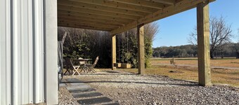 Charming farmhouse-barndominium in delightful Maurice with full kitchen,AC,WiFi