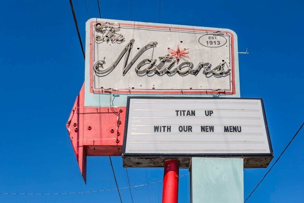 The Nations neighborhood sign near local shops