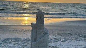 On the beach, sun loungers, beach towels