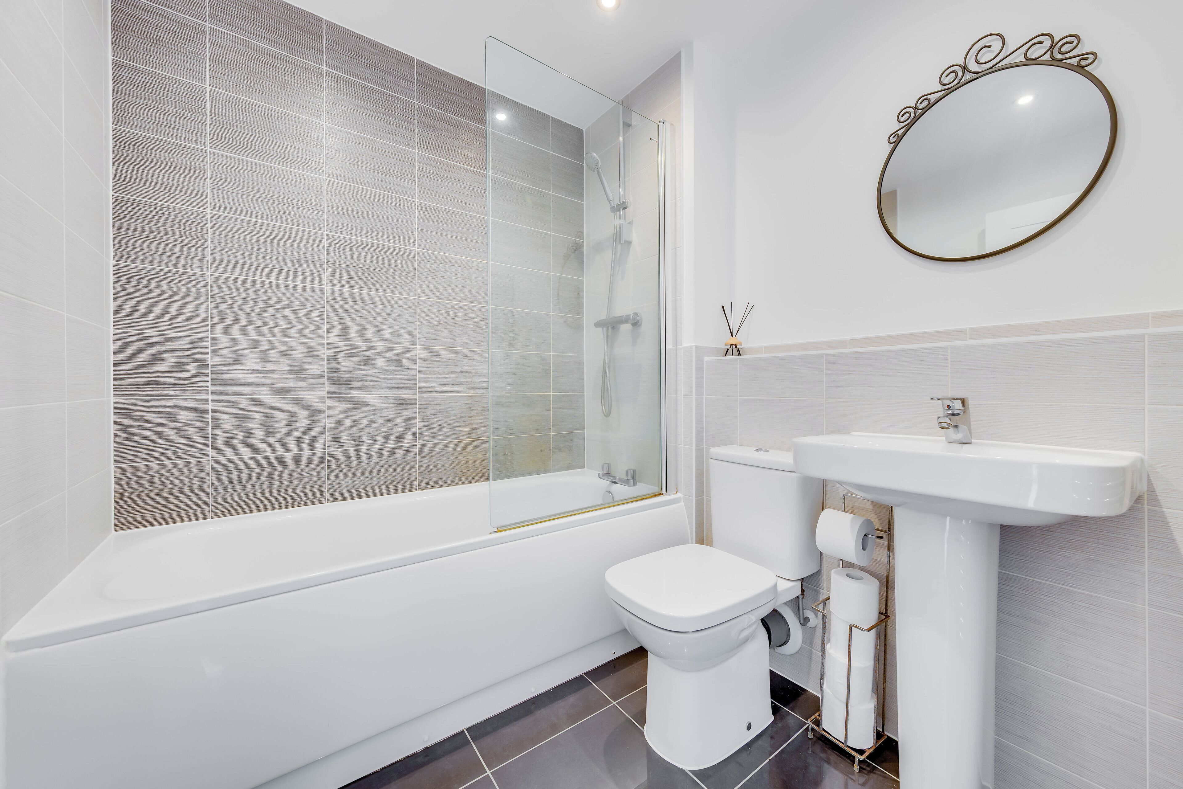 Shower, towels, soap, toilet paper