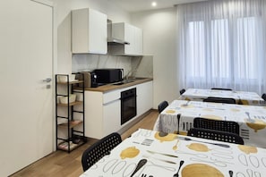 Fridge, microwave, coffee/tea maker, highchair