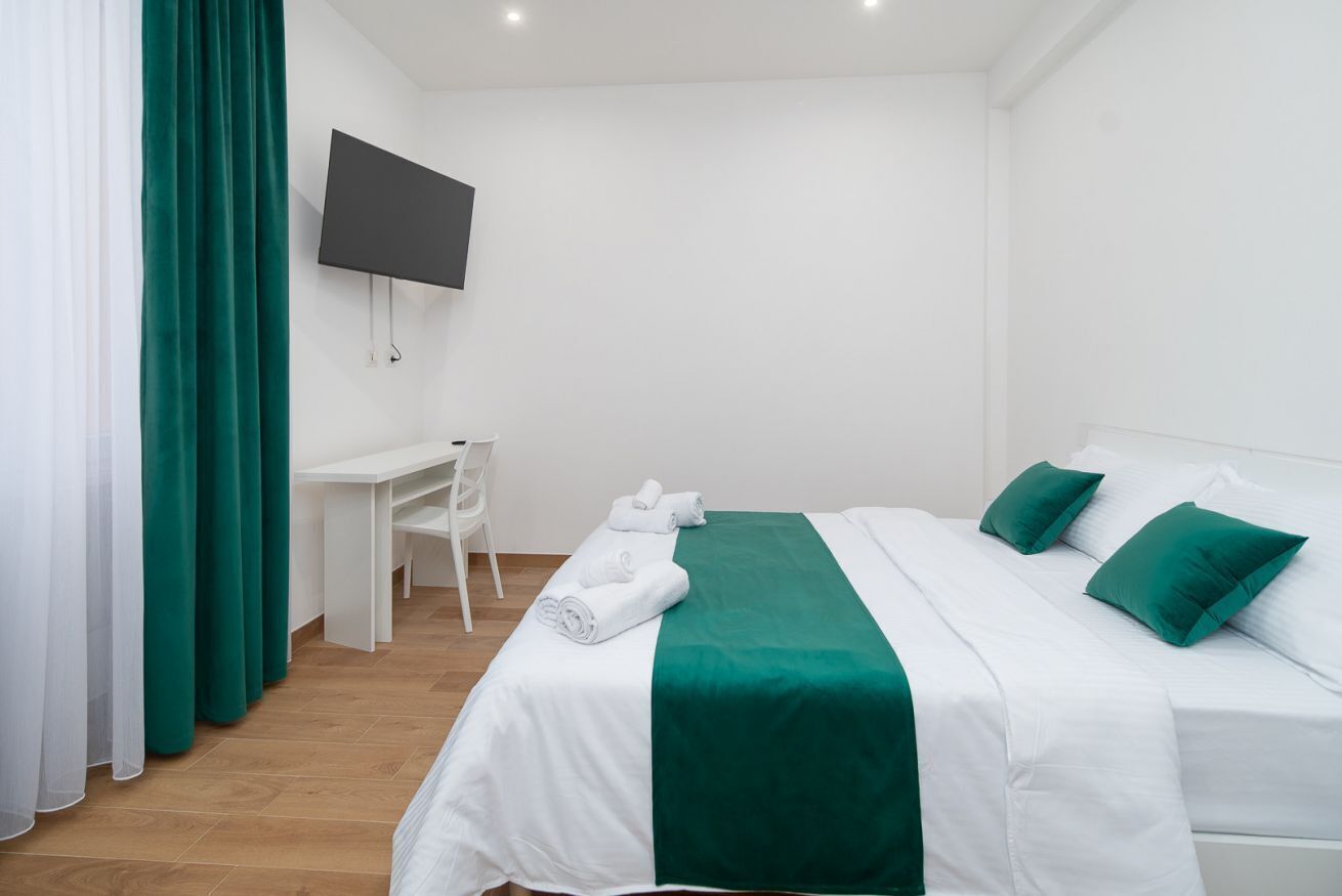 1 slaapkamer, een strijkplank/strijkijzer, wifi, beddengoed