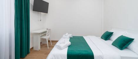 1 slaapkamer, een strijkplank/strijkijzer, wifi, beddengoed