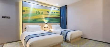 A hotel room with two beds, a large abstract painting on the wall, and a geometric patterned floor.
