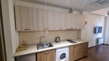 Fridge, microwave, dishwasher, coffee/tea maker