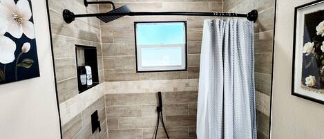 Shower, hair dryer, towels, soap