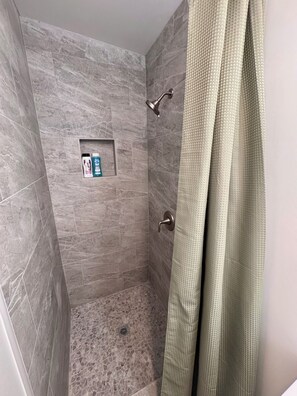 Hair dryer, towels, soap, shampoo