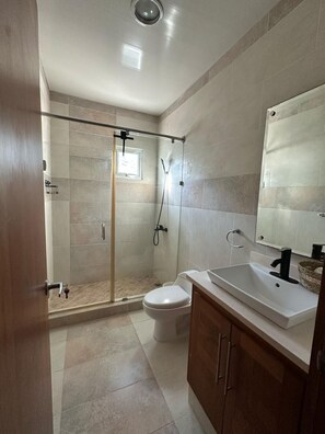 Shower, hair dryer, towels, soap