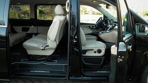 A Mercedes-Benz van interior with a beige interior, a steering wheel, and a dashboard. - Villa "Domus Roma" - Room Piazza Navona (Roma)