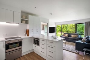 Stovetop, dishwasher, coffee/tea maker, cookware/dishes/utensils