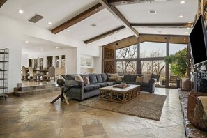 TV, fireplace, books
