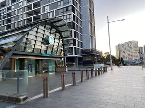 A modern building with a glass facade and a sign reading 'North Hyde.'