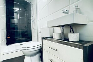 Shower, hair dryer, soap, shampoo