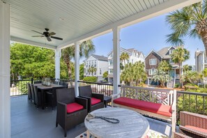 Outdoor dining - Pet-Friendly Wild Dunes Stay – Pool Access + Porches & Classic Coastal Style (Isle Of Palms)