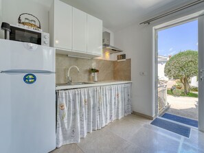 Fridge, microwave, cookware/dishes/utensils