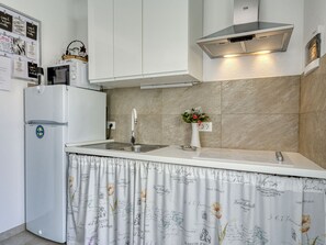 Fridge, microwave, cookware/dishes/utensils