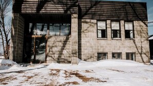 A modern building with a brick facade and large windows. - M2 - Double Queen room #4 (Dalhousie)