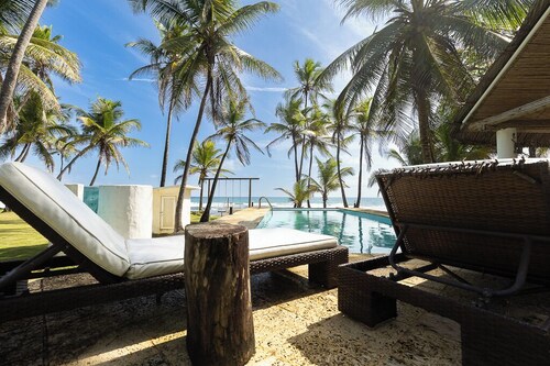 4-bedroom beachfront paradise in Palenque with AC, pool, walking trail and more!