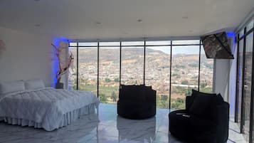 Habitación Deluxe, vista a la ciudad | Ropa de cama de alta calidad y edredón