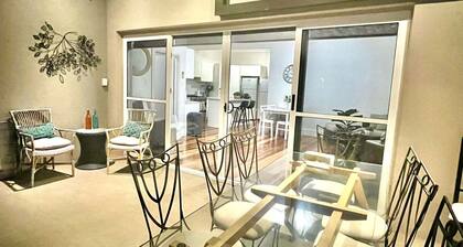 Lovely room in a shared home right next to the beach with lots of fun activities