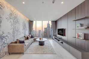 Three Bedroom Apartment | Living area | 42-inch Smart TV with cable channels, Netflix, streaming services - Grand Mansion (Phnom Penh)